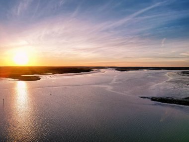 Sunset at the River Colne and Brightlingsea Beach in Essex, UK