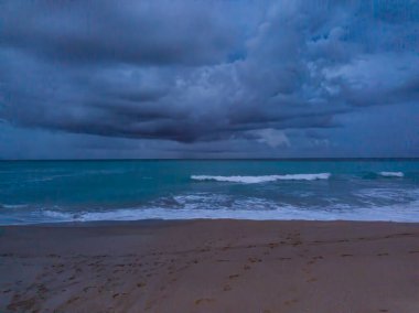 Evening storm clouds at Juno Beach in Florida, USA clipart