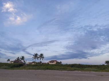 An early morning sky over Juno Beach, Florida, USA clipart