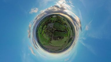 A tiny planet aerial view of Belvoir Castle near Melton Mowbray in Leicestershire, UK clipart