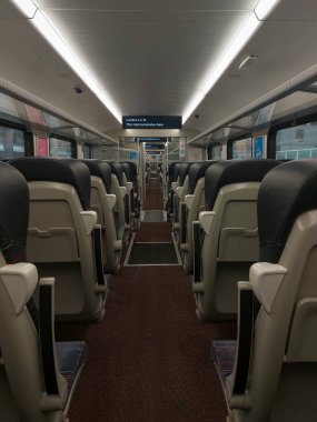 Rows of seats in an empty train carriage in London, UK