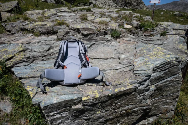 Modern alpine trekking backpack built with resistant and waterproof materials.
