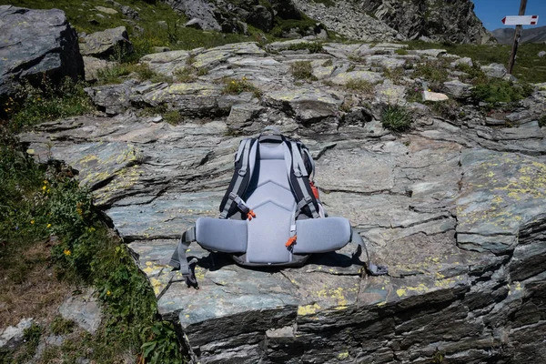 Modern alpine trekking backpack built with resistant and waterproof materials.