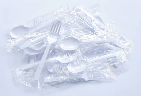 Kochlöffel Und Gabel Aus Kunststoff Für Eine Transparente Verpackung Auf — Stockfoto