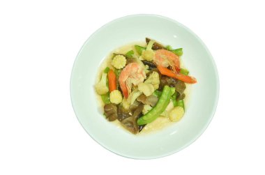 Karışık kızarmış sebze ve siyah mantarlı soya soslu karides.