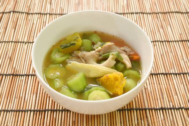 spicy boiled spicy mixed vegetable curry soup on bowl