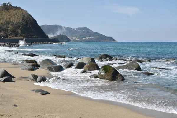 stock image beach landscape at couple rock Meotoiwa for lover with white column on beach in Fukuoka Japan 