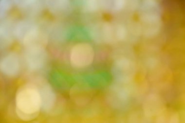 Bulanık sarı parlak ışık arkaplanı ve dokusu 