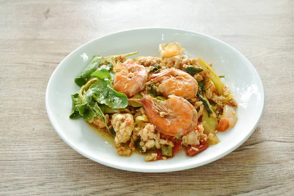 stock image spicy chili stir fried mashed chicken and shrimp with basil leaf on plate