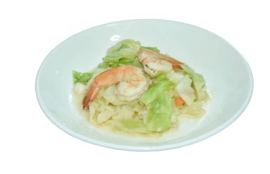 Kızarmış lahana ve soya soslu karides.