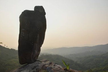 Khao Hua Muak big rock look like wearing hat on mountain in Thailand clipart