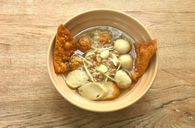 boiled Hakka meatball made fish and shrimp with bean sprout and lettuce in spicy soup on bowl  