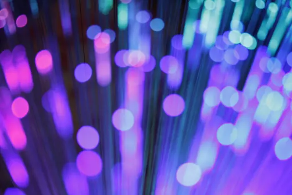 Ein wunderschner Lichtspiel Hintergrund der schn leuchtet in den Farben lila und Blau. Der Hintergrund eigenet sich gut of Homepages oder of Papierhintergrnde.