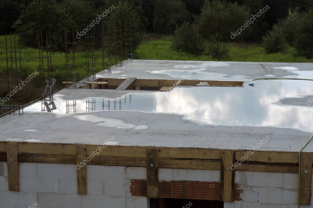 The concrete slab sprayed with water on the first floor, a stairwell ... photo