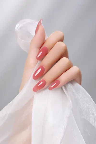 Image of beautiful women\'s hands trying on cosmetics, beautiful hands with cosmetics, hi res photo