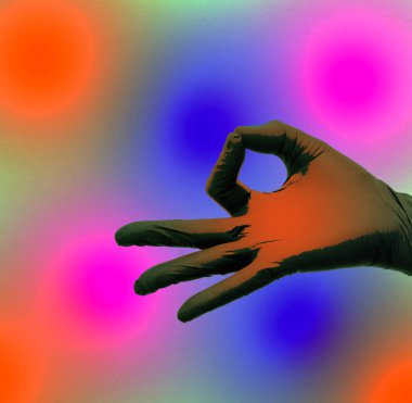 Renkli arka planda siyah eldivenli bir elin sembolleri.