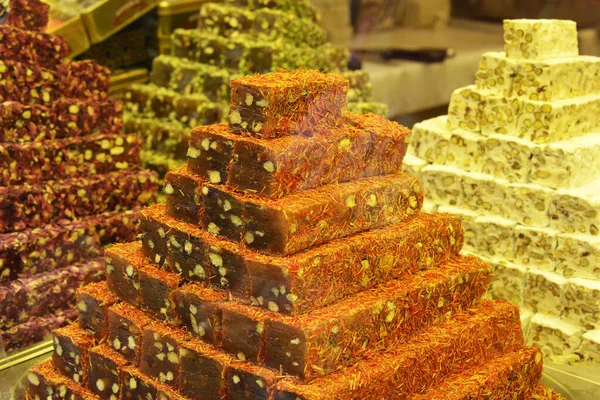 stock image Various rolls of Turkish delights on the market stall in the street market in Istanbul