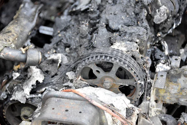 stock image Burned car on the parking place by the road, after the car crash