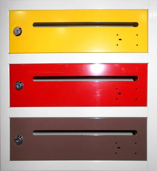 Differently Colored Metal Mailboxes Built Wall — Stock Photo, Image