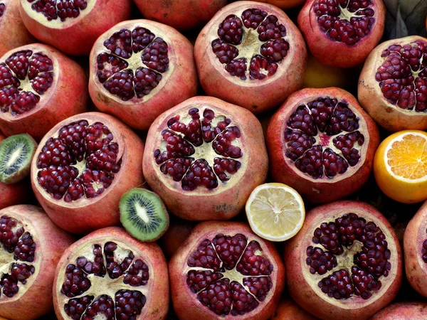 stock image Pomegranates, oranges, grapefruits, tangerines, kiwi