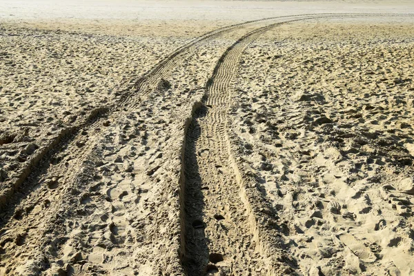 stock image Tire tracks on the sand as a background