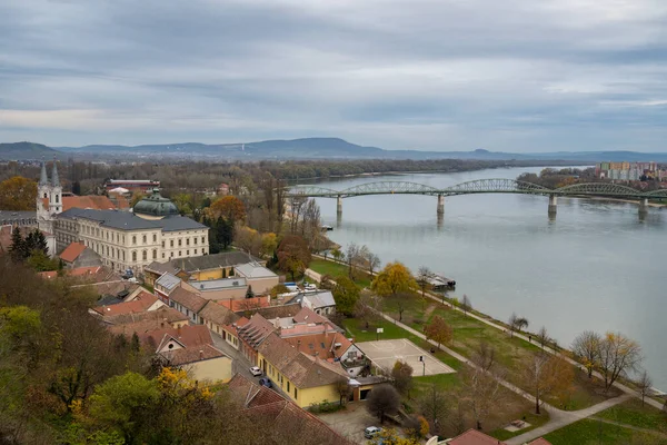 stock image A panoramic view of Esztergom, Hungary and the Danube river, on a hazy, overcast winter day. On the other bank of the Danube is Slovakia.