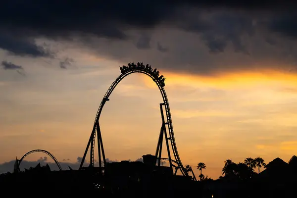 Silhouette People Riding Roller Coaster Sunset Time Cloudy Day — Stock Photo, Image