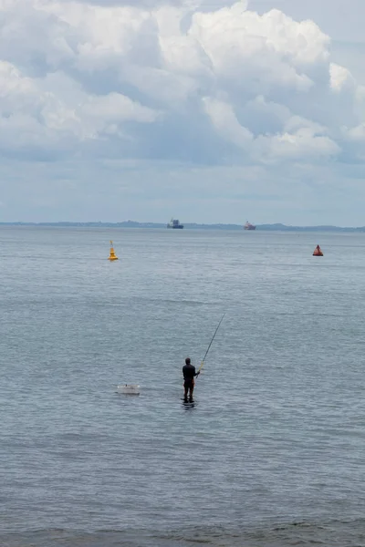 fisherman on the beach of Barra in Salvador bahia northeast of brazil
