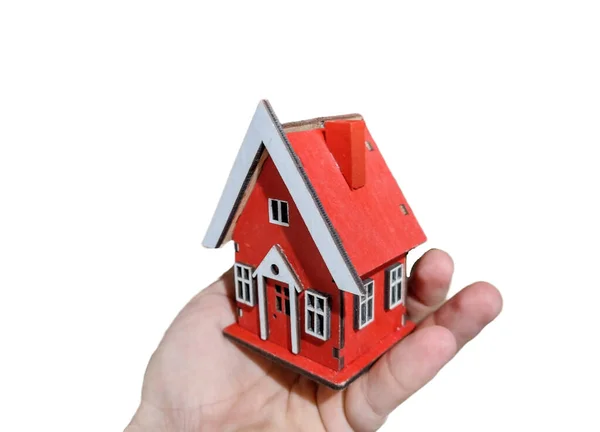 小房子在手 卖房子 房地产的概念 不流动的市场 财产贸易 免版税图库图片