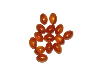 Royal Jelly capsules isolated on white background