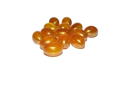 Royal Jelly capsules isolated on white background