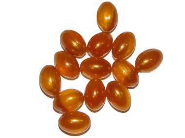 Royal Jelly capsules isolated on white background