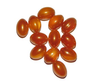 Royal Jelly capsules isolated on white background