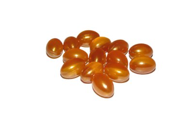 Royal Jelly capsules isolated on white background