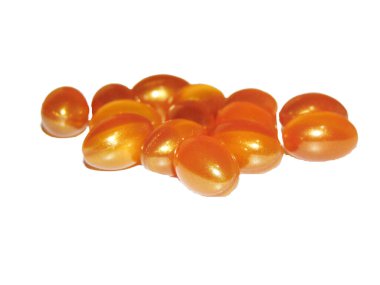 Royal Jelly capsules isolated on white background