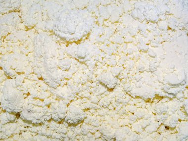 Süzme peynirli arka plan. Yiyecek.