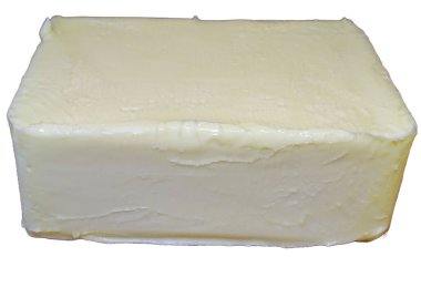 Beyaz üzerine izole edilmiş organik inek sütü yağı.