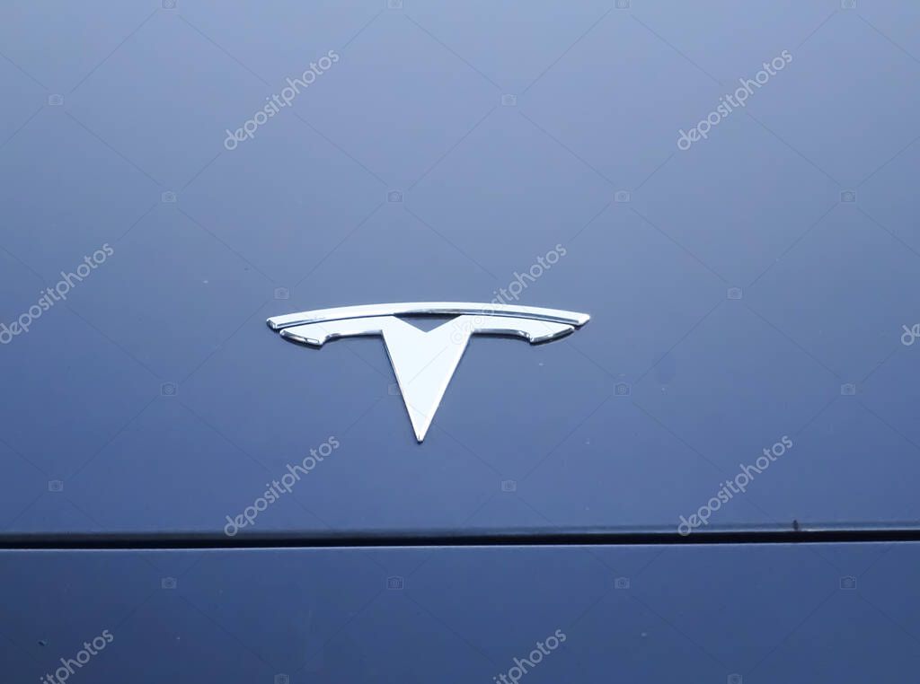 Baia Mare, Romania - September 04 2024: Tesla logo on a car