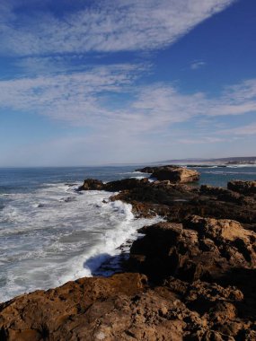 Stunning vertical view of rocky coastline and sky, Essaouira, Morocco. High quality photo