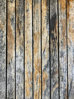 Kahverengi ve gri kumlu, kirli ahşap dikey panelleri kapatın. Yüksek kalite fotoğraf