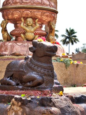 Smiling holy cow statue, Darasuram temple, Tamil Nadu, southern India. High quality photo clipart