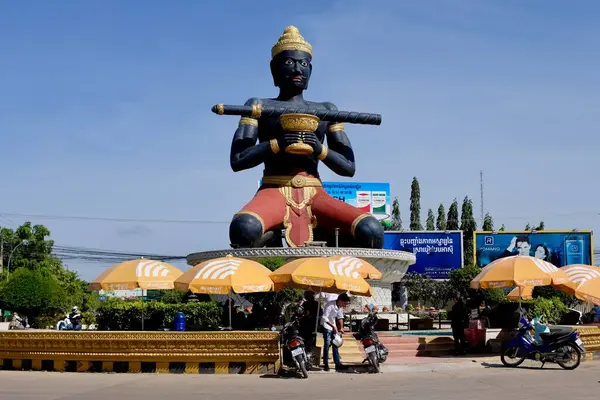 stock image The huge Ta Dumbong Kro Aung (black man with lost stick) statue, symbol of folk legend Battambang Cambodia. High quality photo