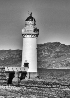 Deniz fenerine yakın, mavi gökyüzü, Mull Adası, İskoç Hebrides. Büyük kopya alanı. Yüksek kalite fotoğraf