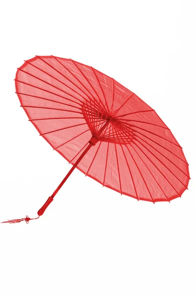 Payung Merah Pada Latar Belakang Putih — Stok Foto