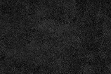 Siyah süet yakın plan. Tasarım ya da proje için doğal siyah süet dokusu. Kadife, deri ters