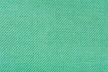 Mobilya döşemesi için kumaş dokusu. Mobilya için dayanıklı kumaş. Yeşil kumaşın dokusu üst görünümü kapat