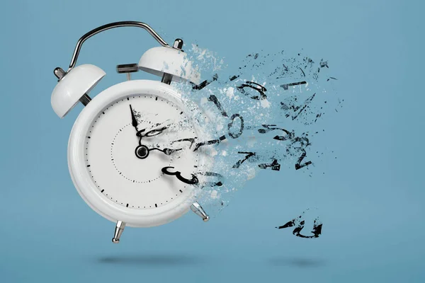 stock image Time is running out. White alarm clock with flying numbers as a symbol of lost time. The concept of time is running out, loss or lack of time, an alarm clock with numbers shatters into small pieces