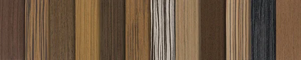 Samples of wood of different species. Pieces of wood veneer in different shades and textures. Samples of wood for the production of floor furniture or doors top view