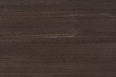 Texture of wood with stripes. Texture of natural African wood with zebra pattern. High resolution photo of a brown black board
