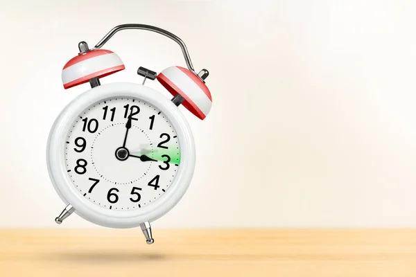 Time change in Austria, spring forward. Summer time concept, over white background. A white alarm clock with a minute hand indicates that the time has been moved forward an hour with copy space